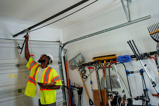 Professional Garage Door Spring Repair technician working in North Wales, PA